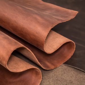 Rolls,Of,Natural,Brown,And,Black,Leather.,Materials,For,Leather